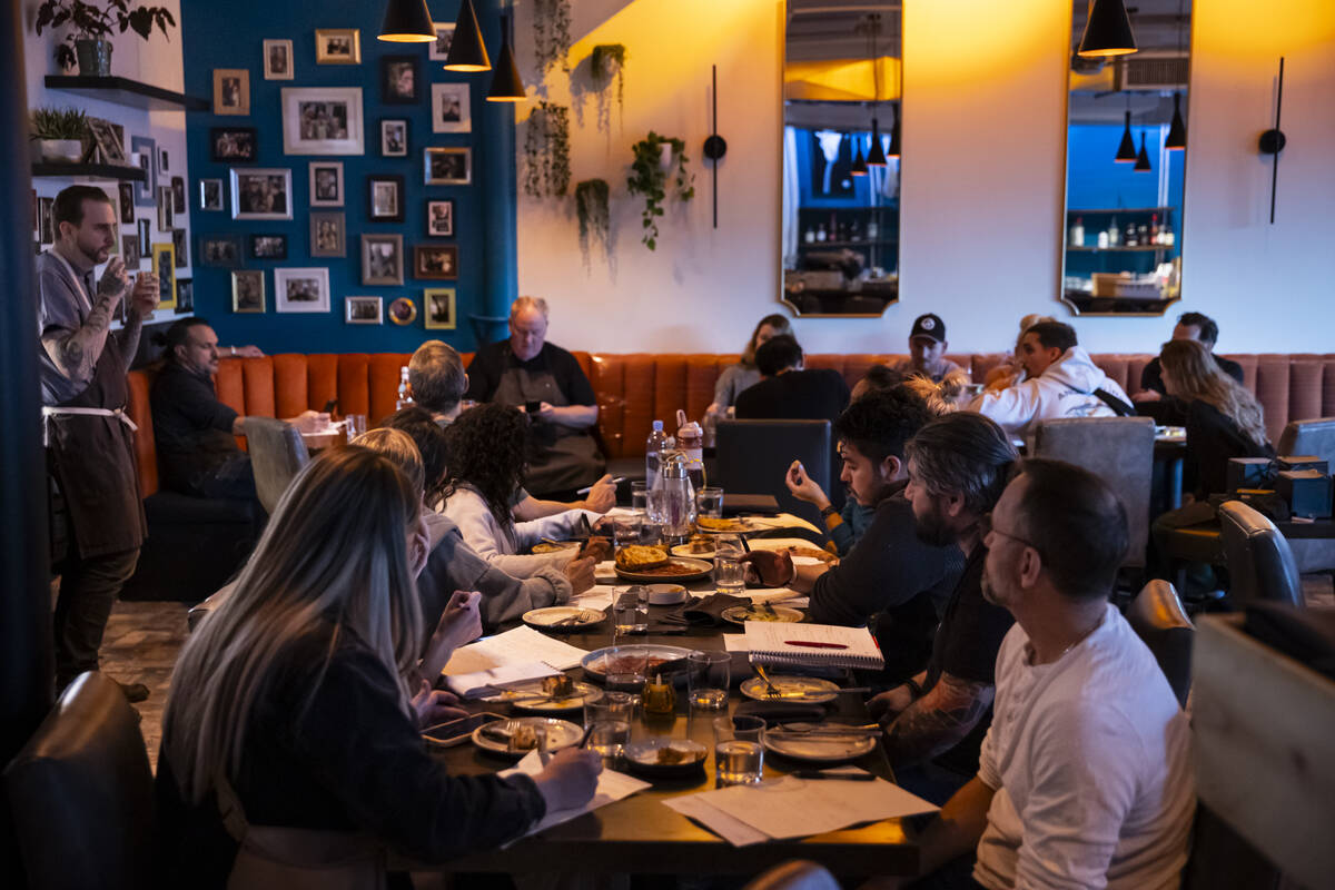 Employees take notes during a staff menu tasting at Ada’s on Wednesday, Dec. 10, 20 ...