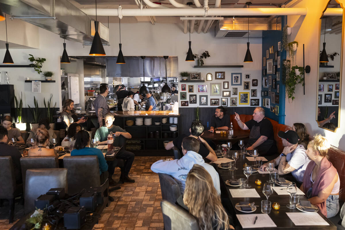 Employees gather for a staff menu tasting at Ada’s on Wednesday, Dec. 10, 2025, in ...
