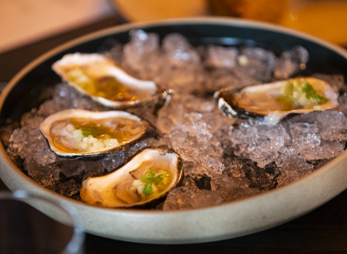Oysters with vinegared cucumber are seen during a staff menu tasting at Ada’s on We ...