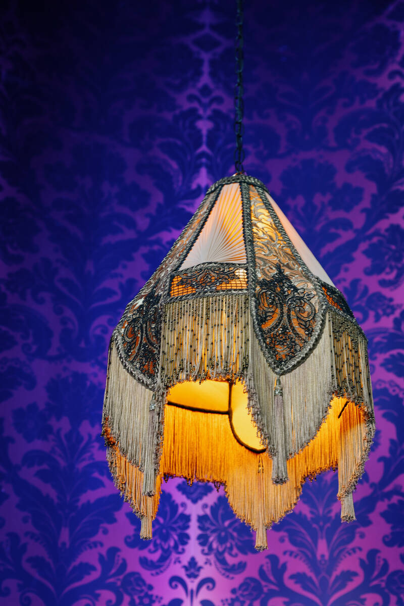 A handmade vintage-style lampshade hangs over a booth at St. Felix Sin City on Thursday, Dec. 1 ...