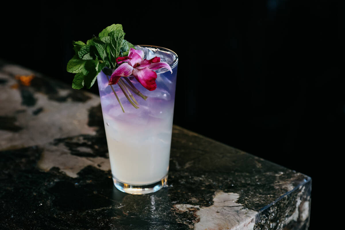 The Purple Reign, with fresh squeezed lemon juice, mariposa magic tea and Martin Miller's Engli ...