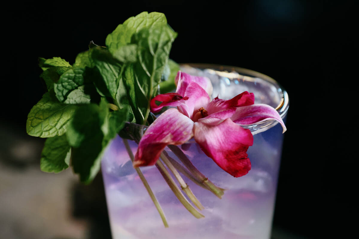 The Purple Reign, with fresh squeezed lemon juice, mariposa magic tea and Martin Miller English ...