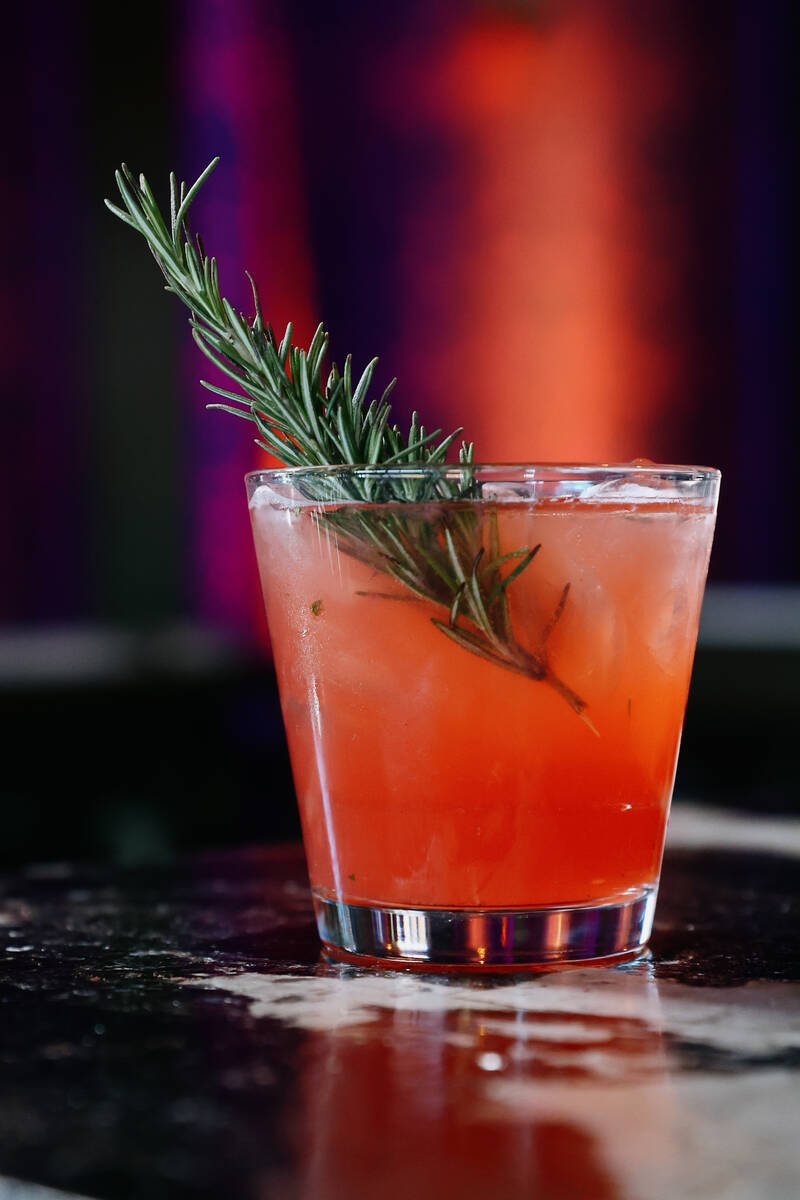 The Stockholm Syndrome, with rosemary, mint, strawberries, fresh lime, pomegranate and Martin M ...