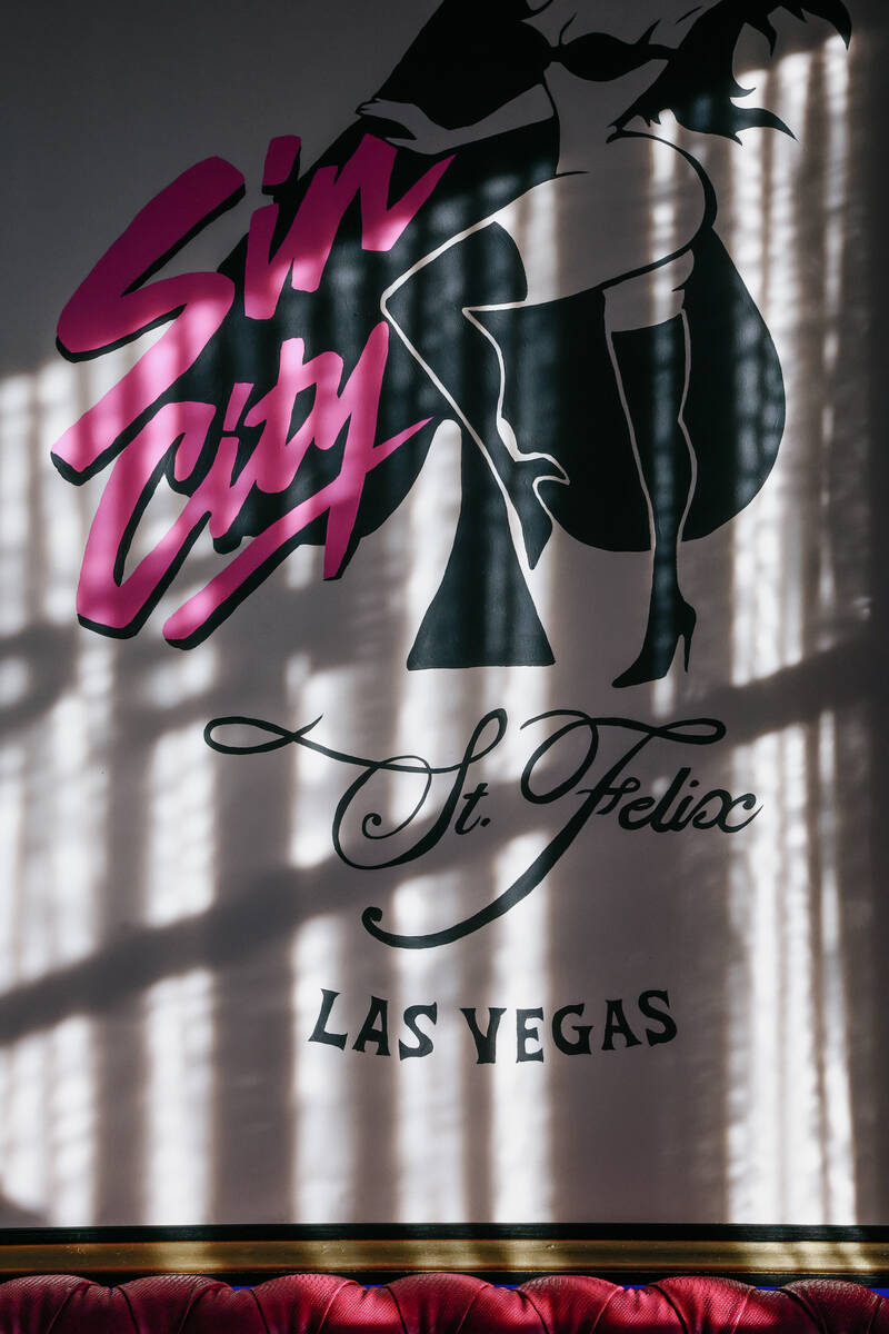 An art piece hangs over a sofa at St. Felix Sin City on Thursday, Dec. 11, 2025 in Las Vegas. ( ...