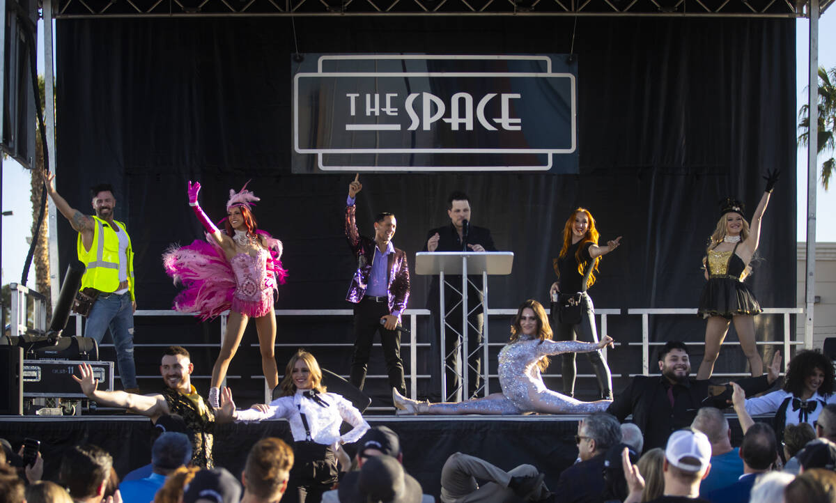 Performers entertain the crowd as Mark Shunock, owner of The Space, talks about The Space 2.0 o ...
