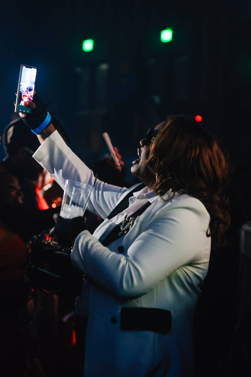 Fans sing along as Young Jeezy performs at Planet Hollywood Friday, Dec. 19, 2025, in Las Vegas ...