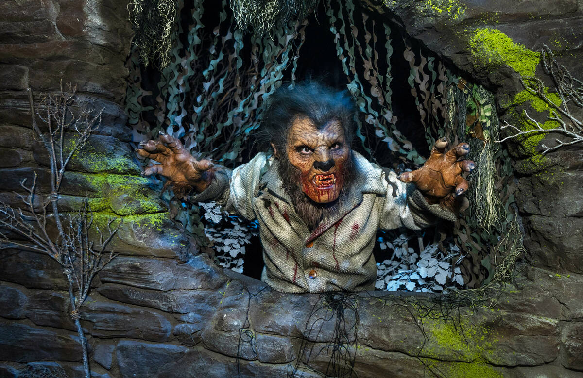 A werewolf pops out from a cave entrance within the Universal Monsters house during a first loo ...