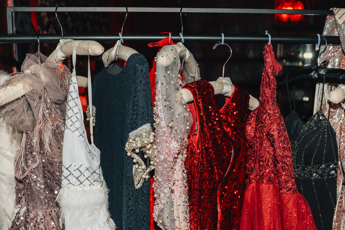 Clothing sits on a rack as decor at Oddyssey Noir at Area15 Saturday, Dec. 13, 2025, in Las Veg ...