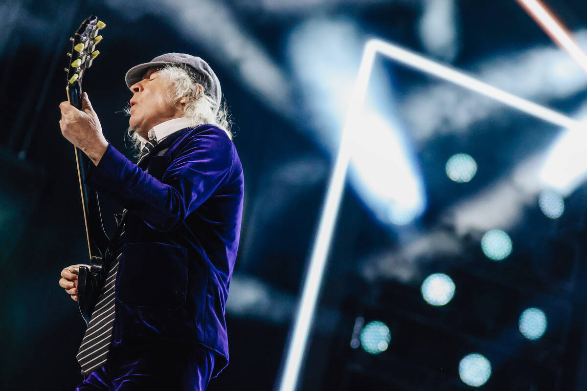Angus Young of AC/DC performs during their “Power Up” tour stop at Allegiant Stad ...
