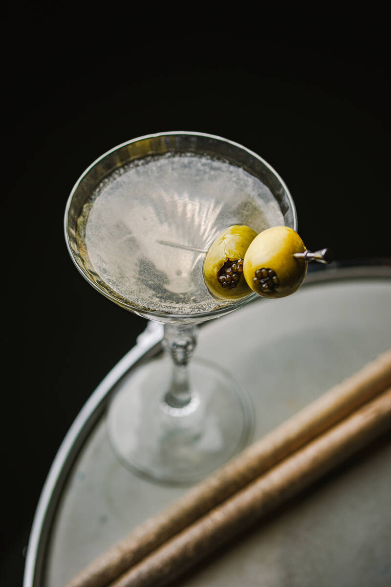 Caspian's Cocktails & Caviar's dirty martini with caviar stuffed olives. ( Jose S ...