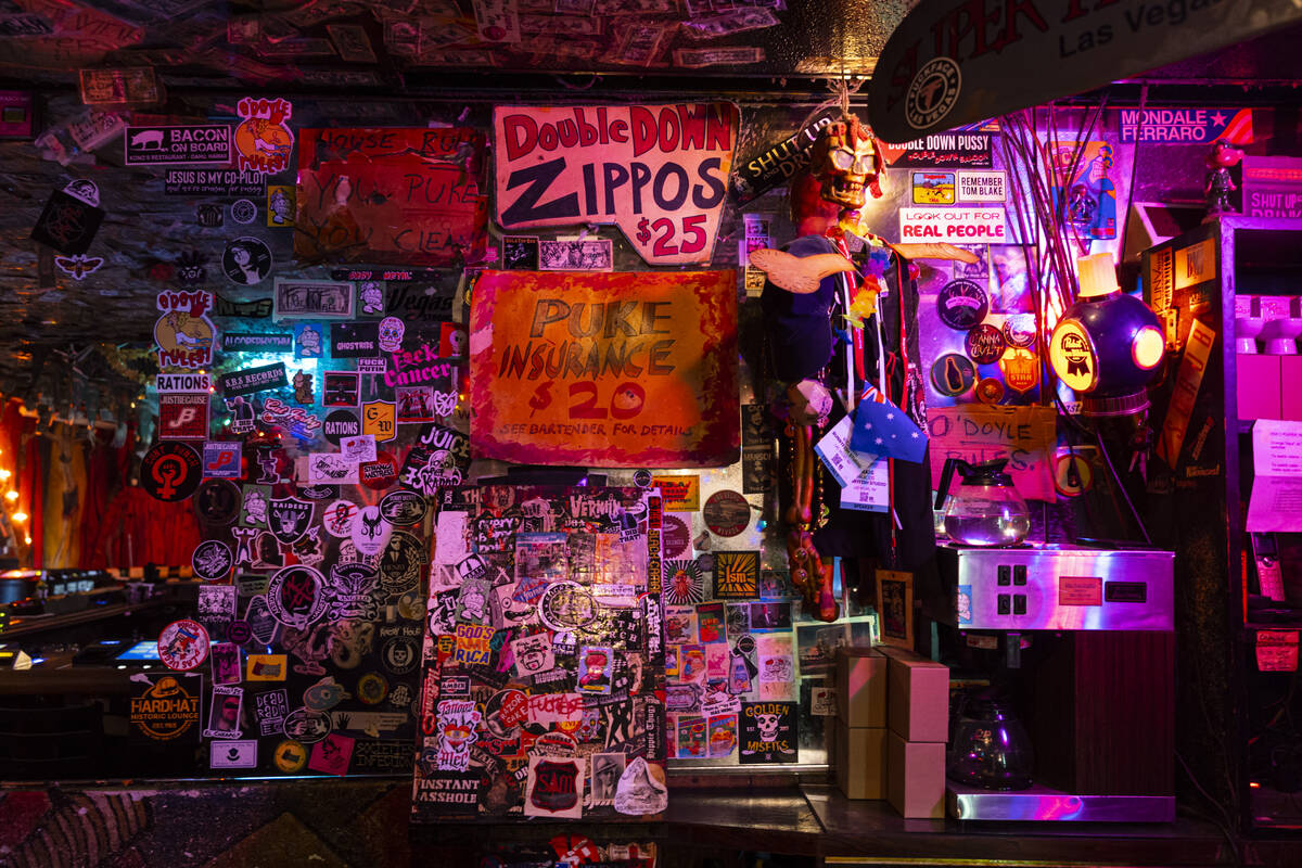 The puke insurance sign is pictured at the Double Down Saloon, on Tuesday, Nov. 15, 2022, in La ...