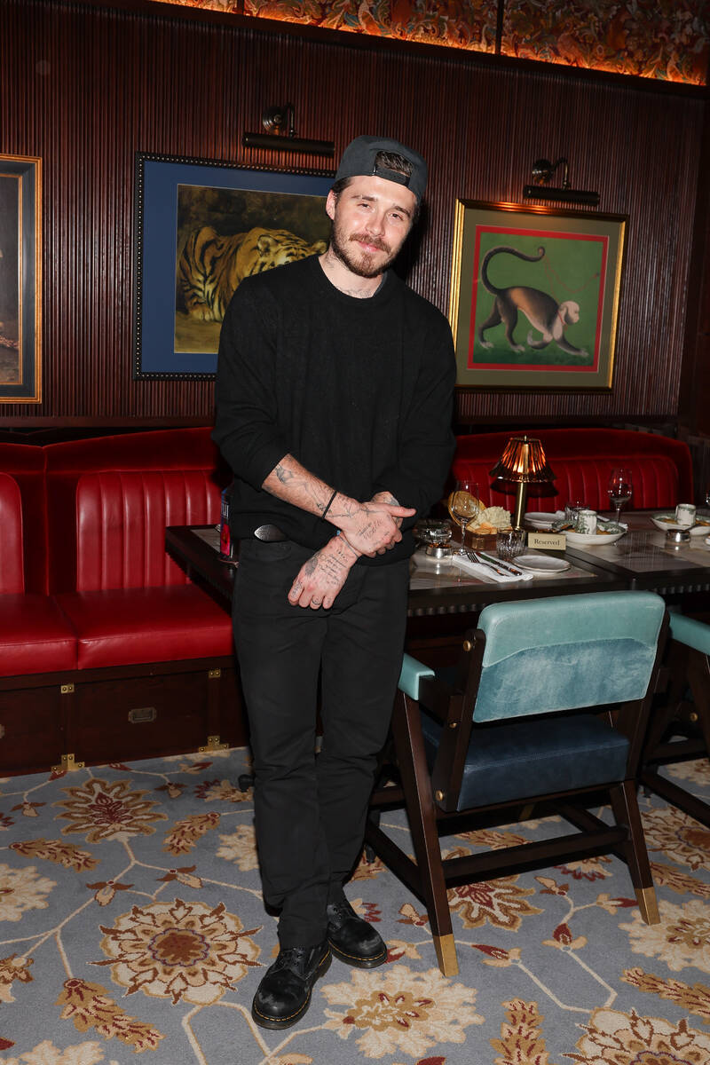Brooklyn Beckham posts at the opening of Gymkhana in the Aria Friday, Jan. 16, 2026, in Las Veg ...