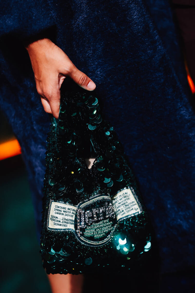 A Perrier themed bag on a red carpet during the opening party at Gymkhana in the Aria Friday, J ...