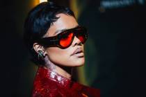 Teyana Taylor poses on a red carpet during the opening party at Gymkhana in the Aria Friday, Ja ...