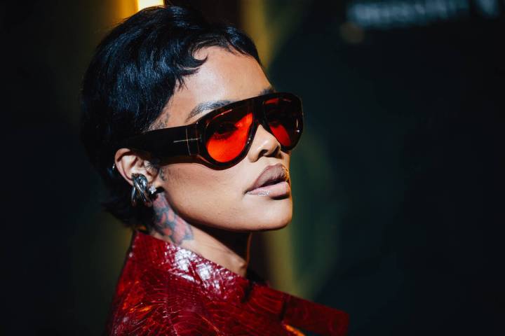 Teyana Taylor poses on a red carpet during the opening party at Gymkhana in the Aria Friday, Ja ...