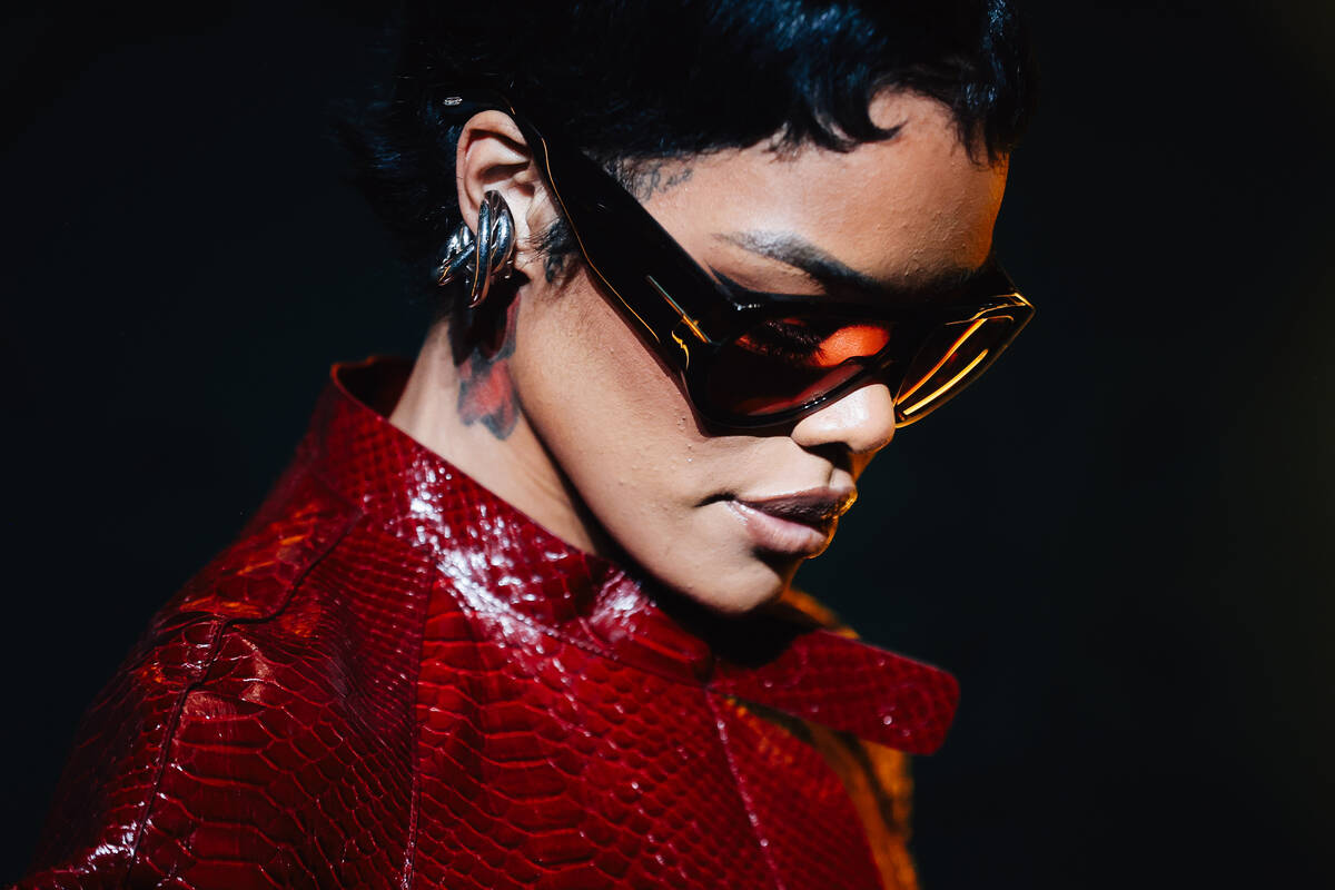 Teyana Taylor poses on a red carpet during the opening party at Gymkhana in the Aria Friday, Ja ...