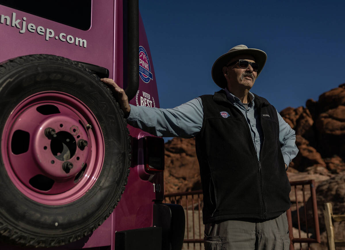 Mike Metzger, an adventure tour guide with Pink Jeep Tours, poses for a photo at Red Rock Canyo ...