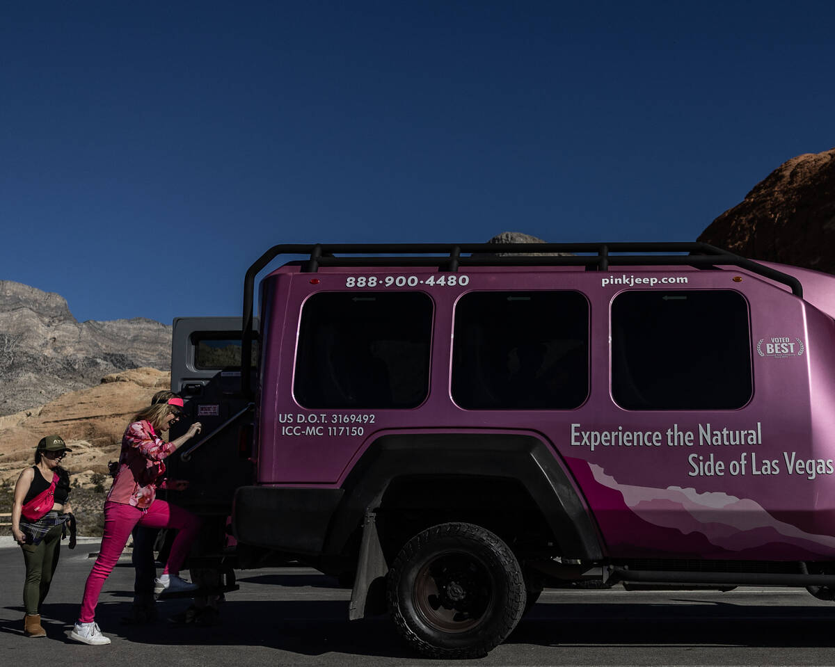 Clients load into a Pink Jeep Tour vehicle at Red Rock Canyon National Conservation Area Tuesda ...