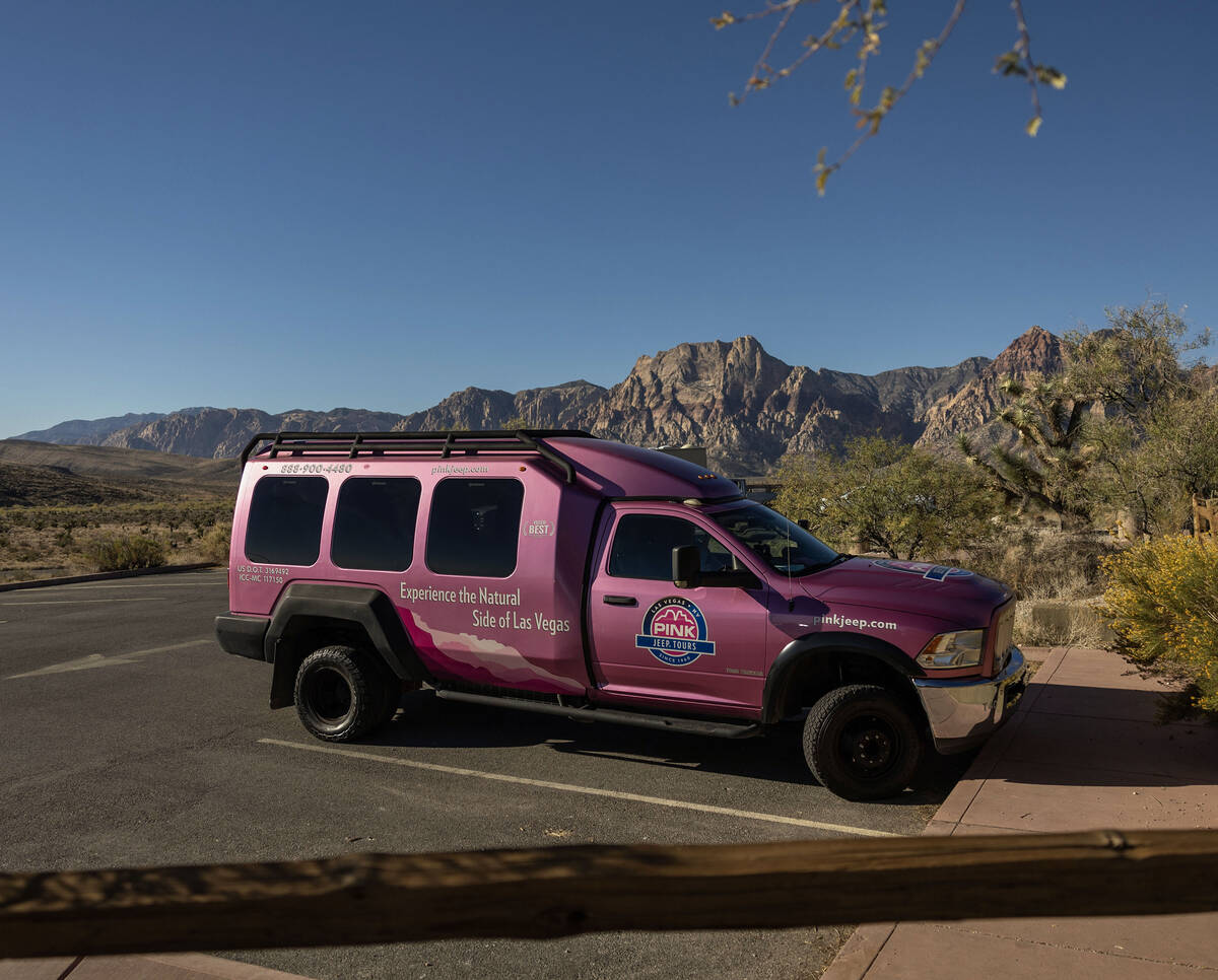 A Pink Jeep Tour vehicle is parked at the visitor center at Red Rock Canyon National Conservati ...
