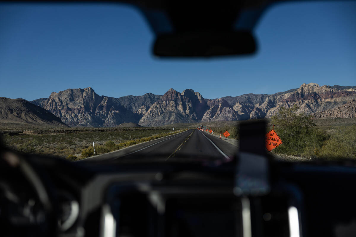 Adventure tour guide Mike Metzger (out of frame) drives clients to Red Rock Canyon National Con ...