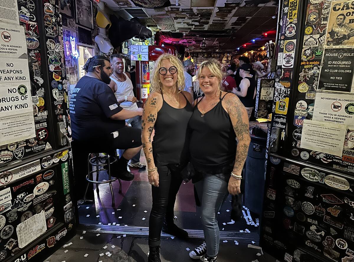 Hogs & Heifers Saloon owner MIchelle Dell, left, and COO Michelle Sandler are shown at the bar' ...