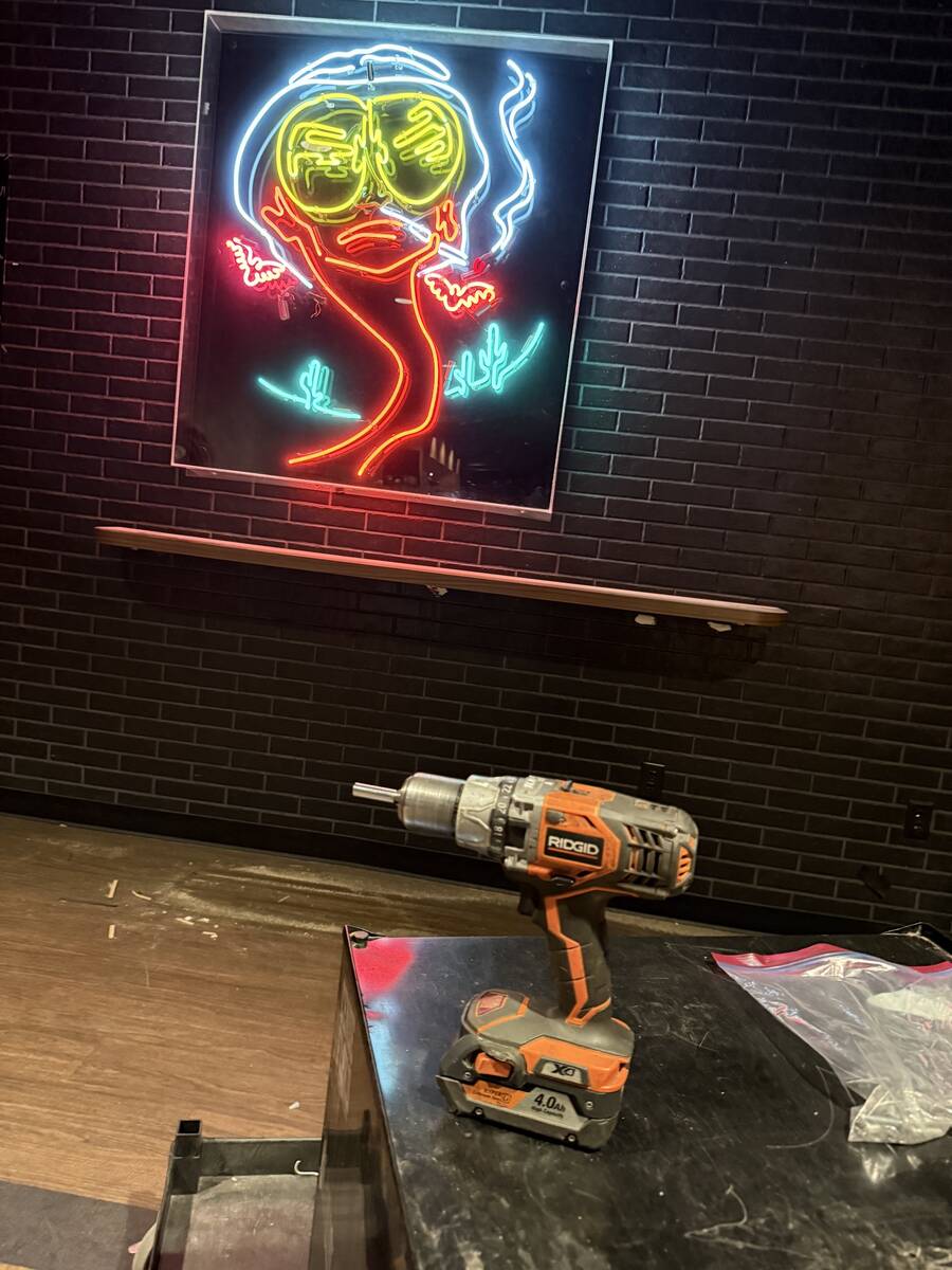 A neon image of Hunter S. Thompson from "Fear and Loathing in Las Vegas," a holdover from Sand ...