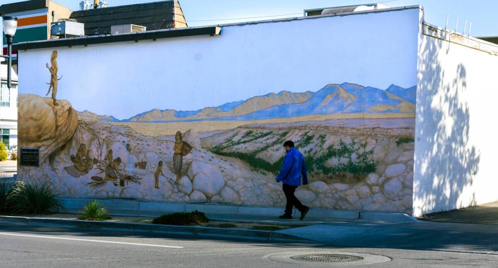 The mural "Henderson's First Residents" can be seen on the side of the 7-11 alon ...
