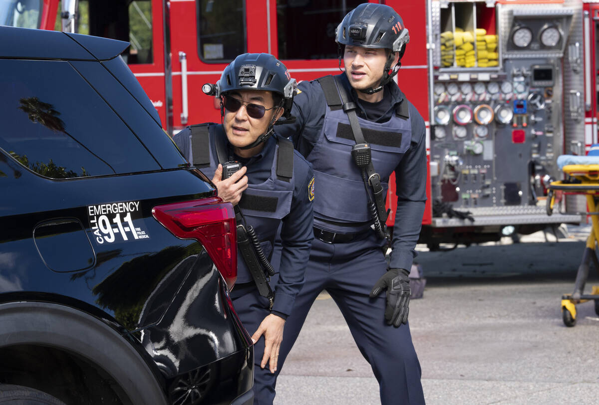 A scene from "9-1-1" episode “War" showing Kenneth Choi and Oliver Stark. (Disney/Christopher ...