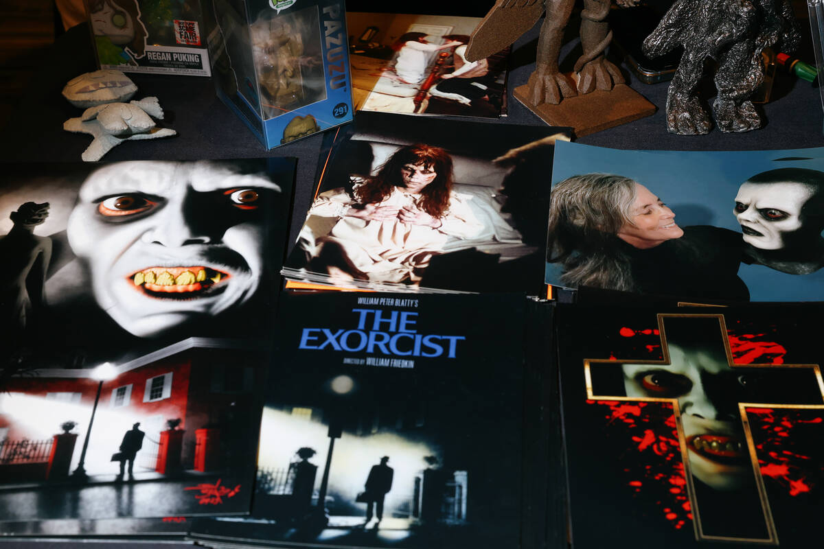 Posters from The Exorcist lay on a table at a booth during Days of the Dead Las Vegas on Friday ...