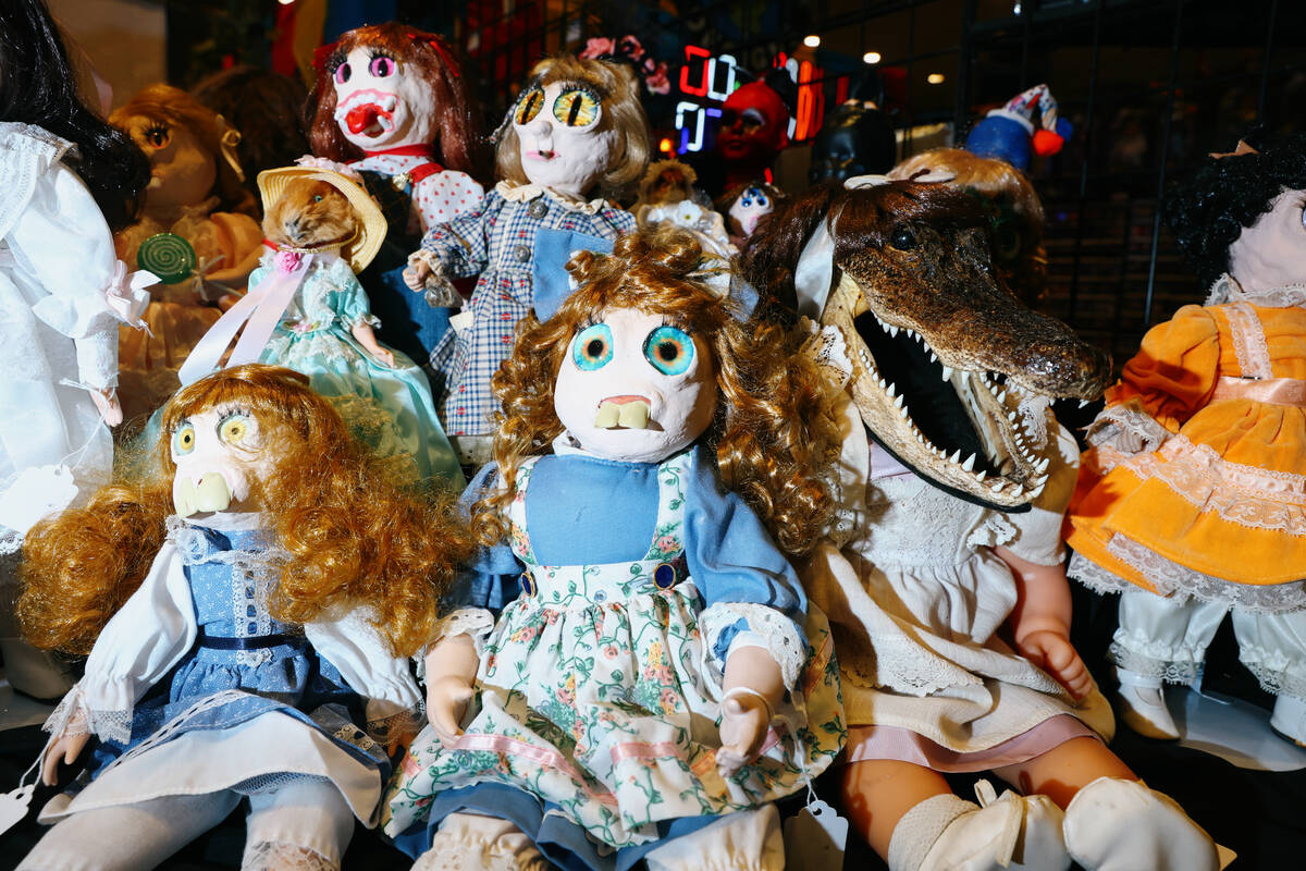 Dolls from Another Odd Family’s booth sit on a table during Days of the Dead Las Vegas o ...