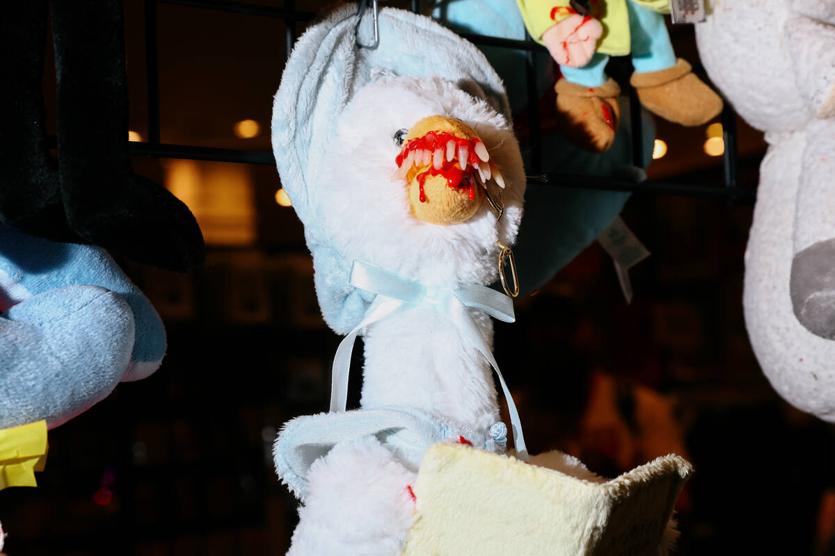 A carnivorous take on Mother Goose hangs from the Killer Art Co. booth during Days of the Dead ...