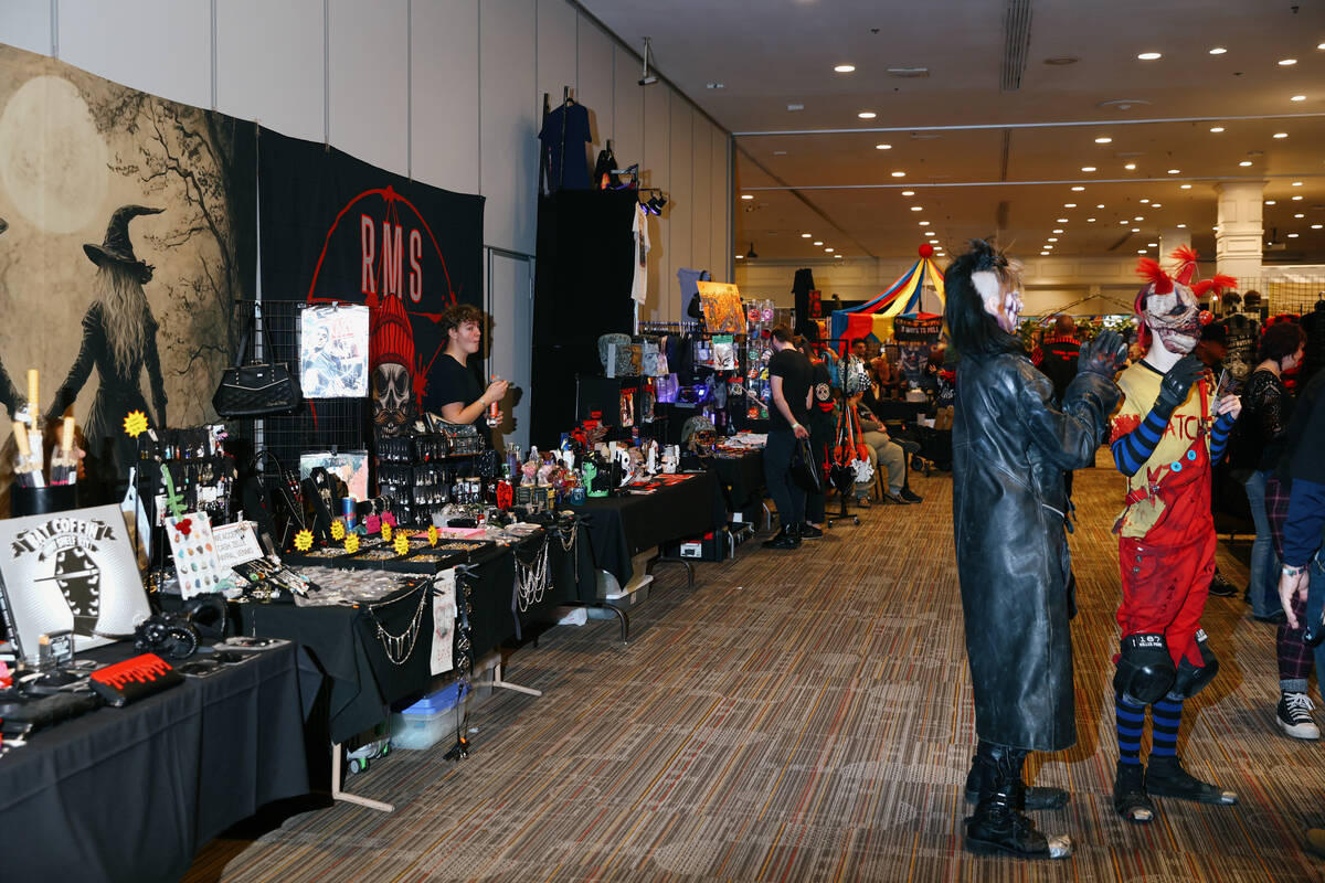 Costumed characters meander amid the booths at Days of the Dead Las Vegas on Friday, Jan. 16, 2 ...