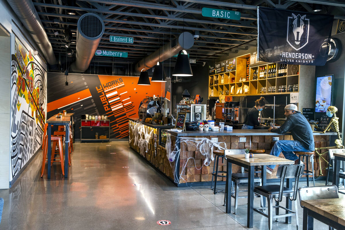 The Public Works Coffee Bar anchors a corner of the small mixed-use complex developed by Windom ...