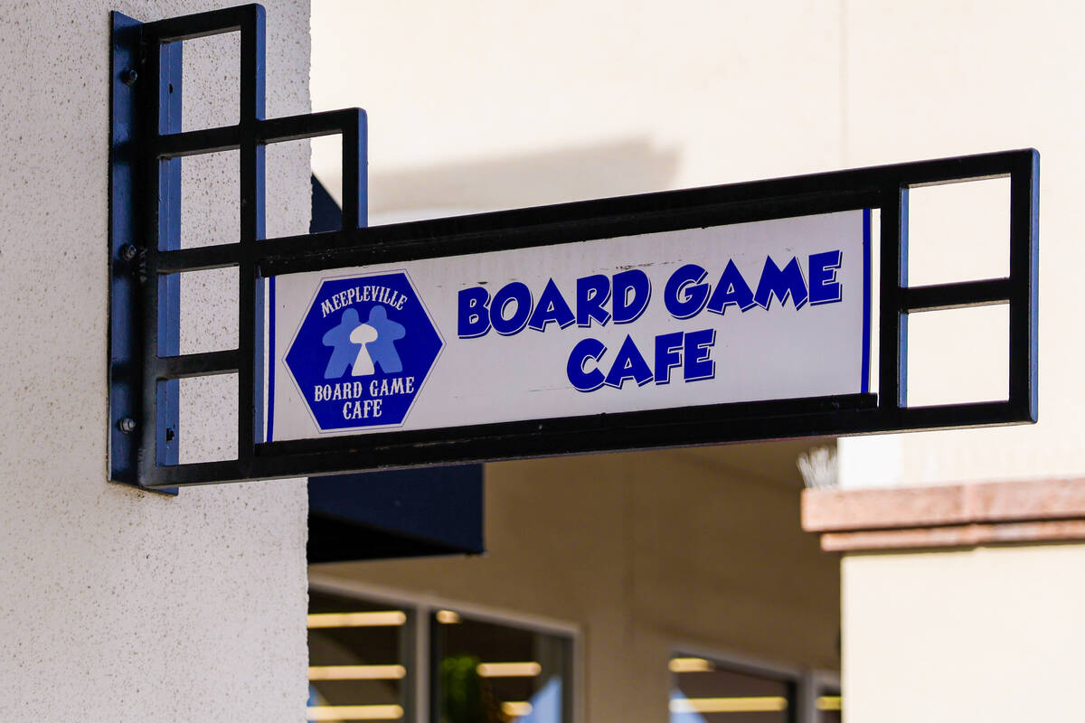 The Meeplevile Board Game Cafe's sign hangs outside in Las Vegas. (Madeline Carter/Las Vegas Re ...