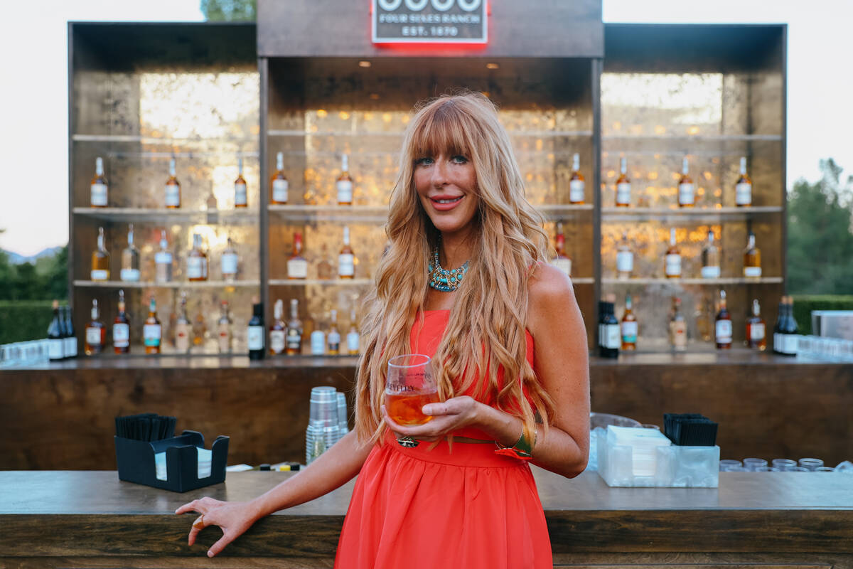 Wynn Resorts master mixologist Mariena Mercer Boarini stands for a portrait holding a drink at ...