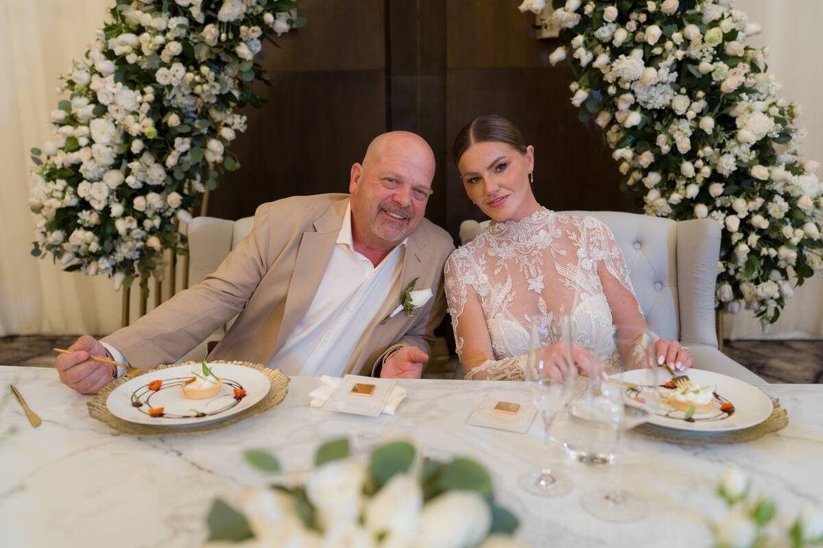 Newlyweds Rick Harrison and Angie Polushkin ares shown during their wedding ceremony in Cancun ...