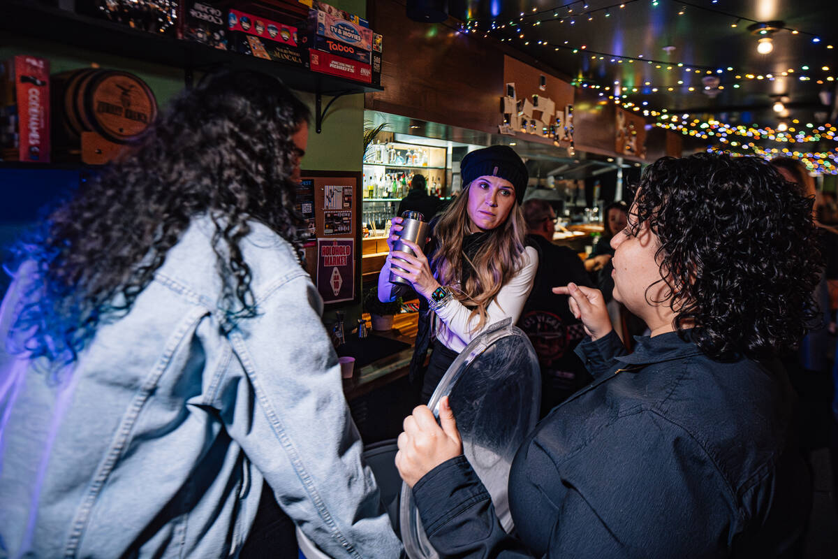 Students learn how to make drinks during a mixology class at F The Bar Friday, Jan. 9, 2026, in ...