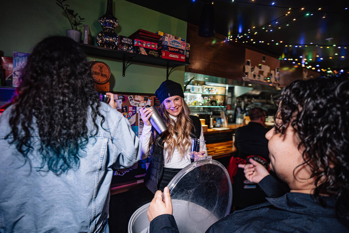Students learn how to make drinks during a mixology class at F The Bar Friday, Jan. 9, 2026, in ...