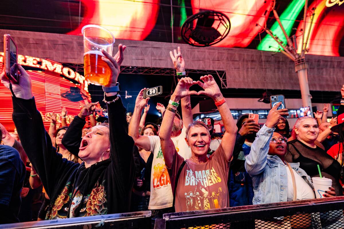 Visitors to downtown Las Vegas are shown at Fremont Street Experience, which is staging “Hear ...