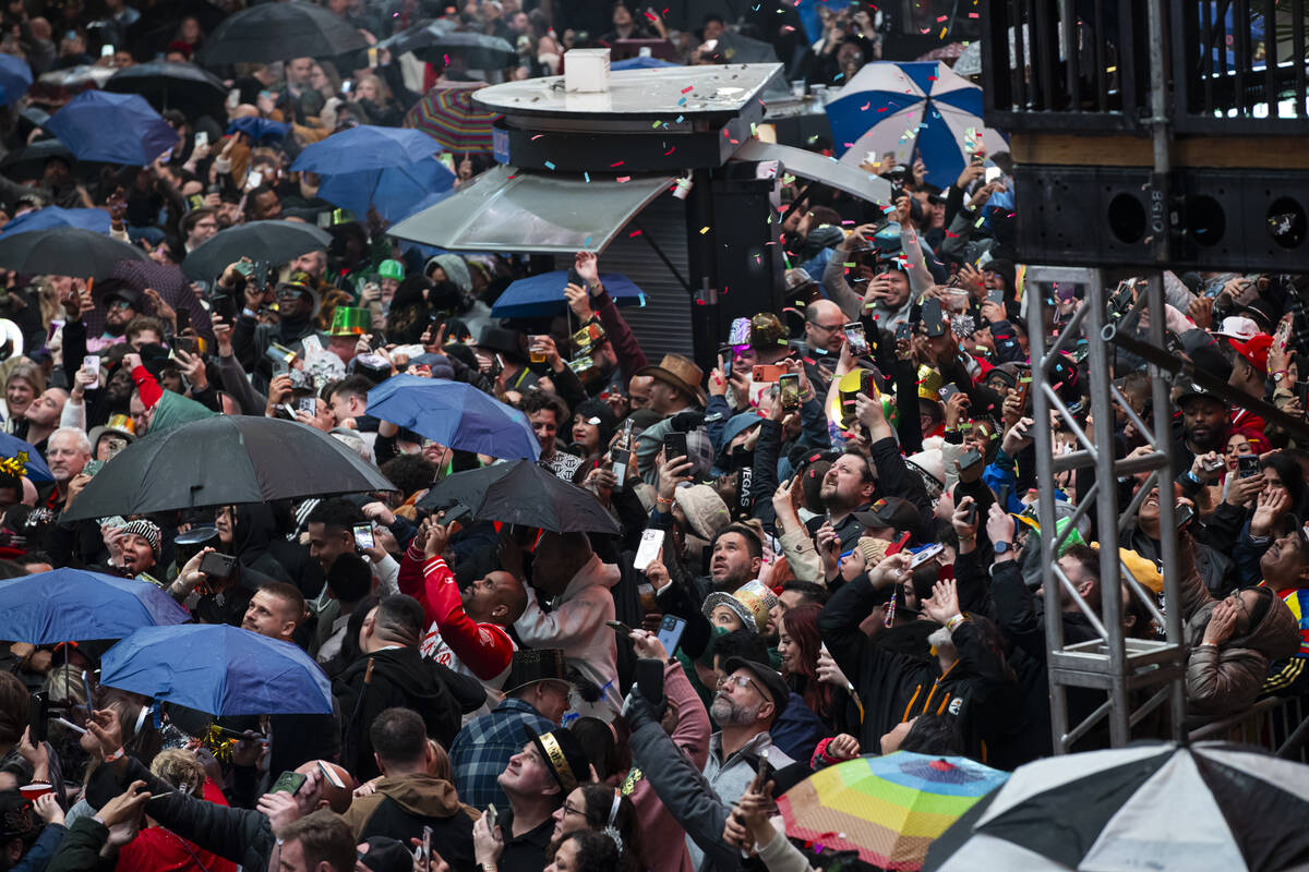 Revelers celebrate the new year at the Fremont Street Experience on Thursday, Jan. 1, 2026, in ...