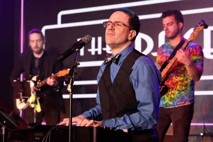 Producer and band leader Kenny Davidsen sings during a birthday party benefit for Las Vegas Rev ...