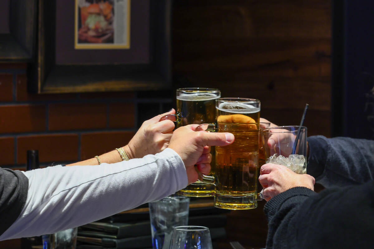 Diners clink glasses on Friday, Dec. 5, 2025 at Guy Fieri's Vegas Kitchen & Bar in The ...