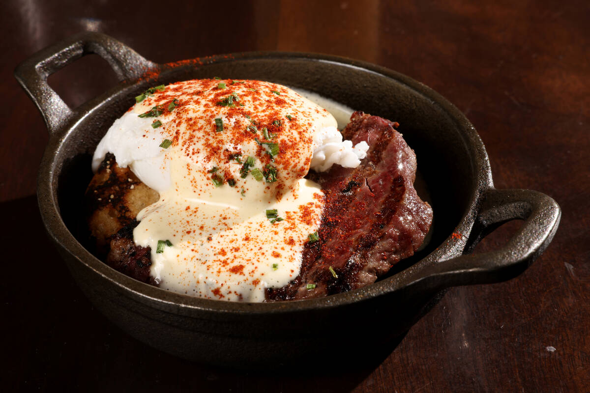 Filet mignon eggs Benedict from the all-you-can-eat brunch at La Cave Wine & Food Hideaway in W ...