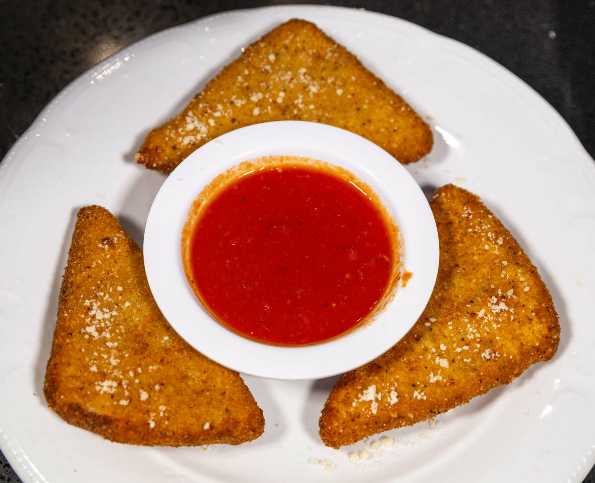 Fried mozzarella from Carmine's Pizza Kitchen, which is celebrating its 50th anniversary i ...