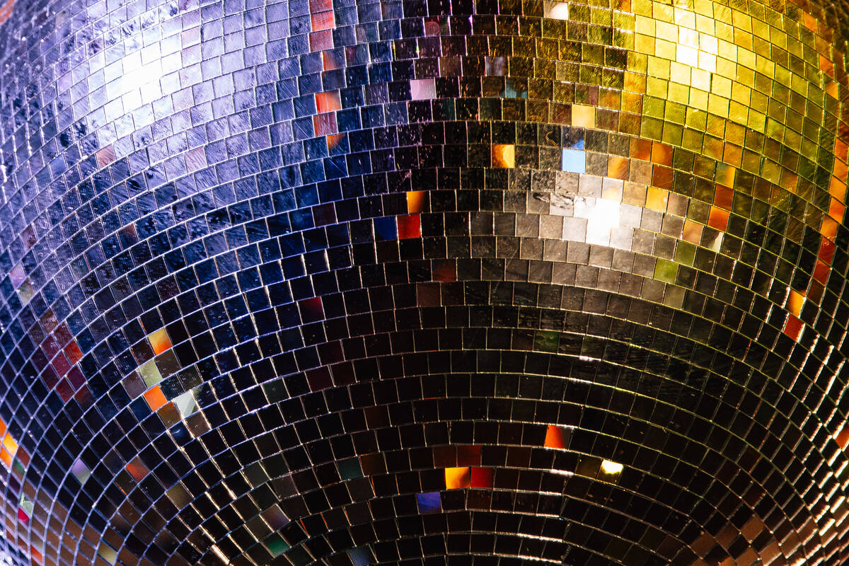A disco ball glows at Pachi Pachi in downtown Las Vegas Saturday, Jan. 24, 2026, in Las Vegas. ...