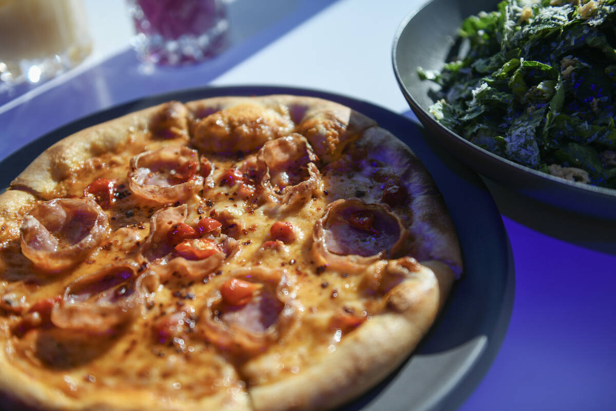 Hot Honey Finocchiona and Caesar salad are seen during the reopening of Grand Prix Plaza Friday ...