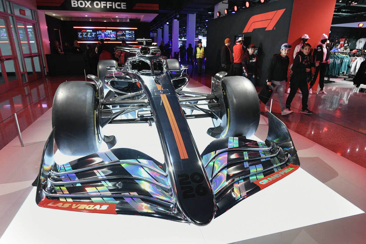 An F1 display car is seen near the entrance during the reopening of Grand Prix Plaza Friday, Ja ...