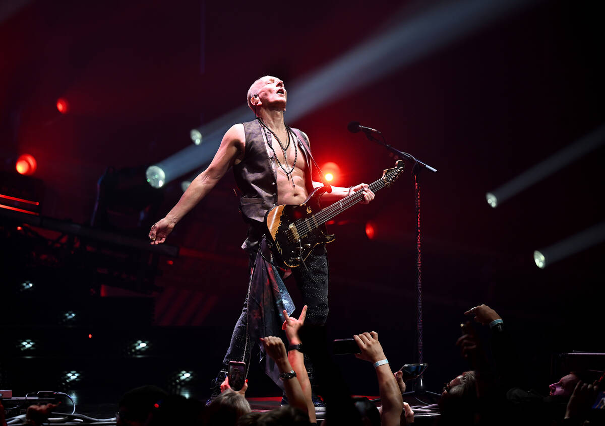 LAS VEGAS, NEVADA - FEBRUARY 03: Guitarist Phil Collen of Def Leppard performs at The Colosseum ...