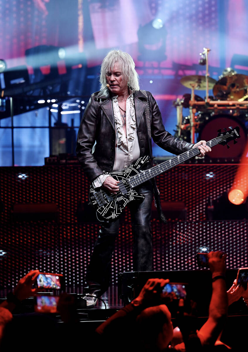 LAS VEGAS, NEVADA - FEBRUARY 03: Bass guitarist Rick Savage of Def Leppard performs at The Colo ...
