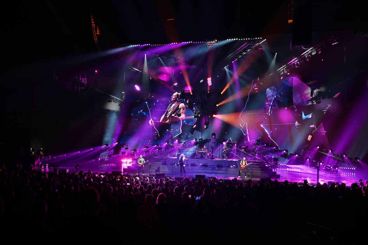 LAS VEGAS, NEVADA - FEBRUARY 03: Guitarist Vivian Campbell, bass guitarist Rick Savage, singer ...